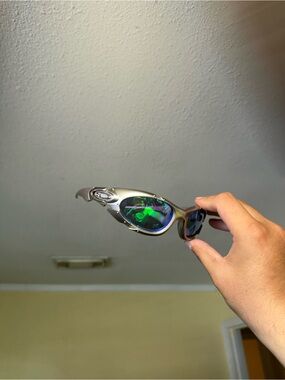 Oakley Women's Silver Frame Sunglasses with Green Mirrored Lenses - Sporty Wrap